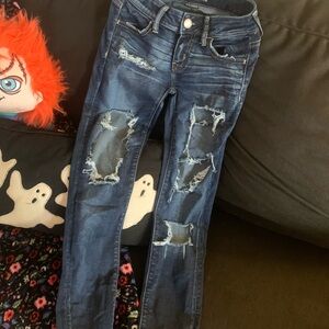 Distressed Blue Jeans